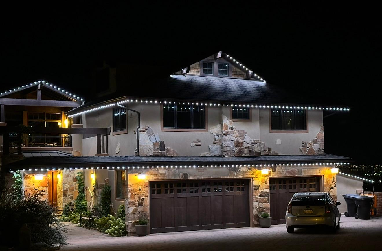 House with permanent LED lighting at night